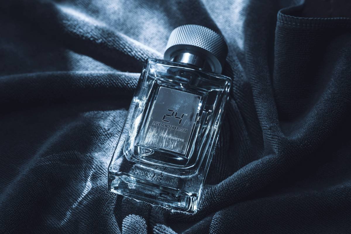 collection of fine cologne for men bottles arranged by season and scent profile
